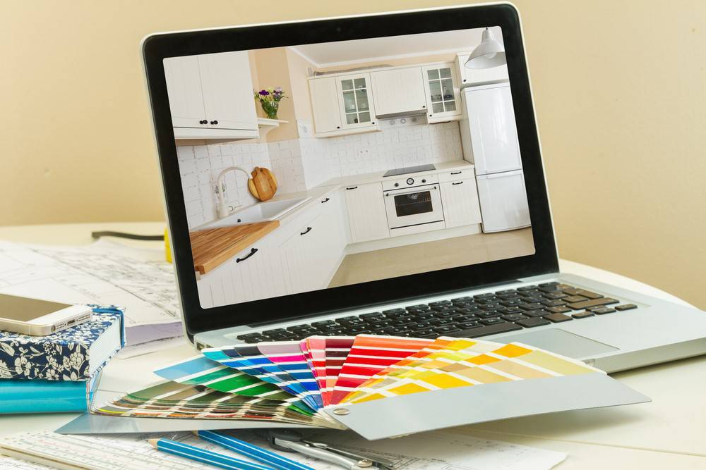 designers-working-table-open-notebook-refubrished-exclusive-kitchen-remodeling-leads-homeguru